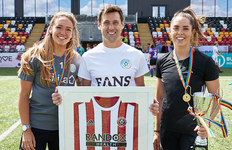 Presentation of a signed football shirt